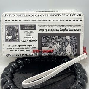 Betsey Johnson Xozip-N newspaper wallet